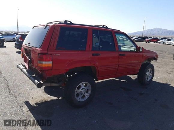 1996 Jeep Grand Cherokee Limited with VIN 1J4GZ78Y0TC376265, listed as a Copart auction lot 52124345 with 205,676 mi miles and Salvage Title. Bid and sale history available at carsss.com. Image 3.