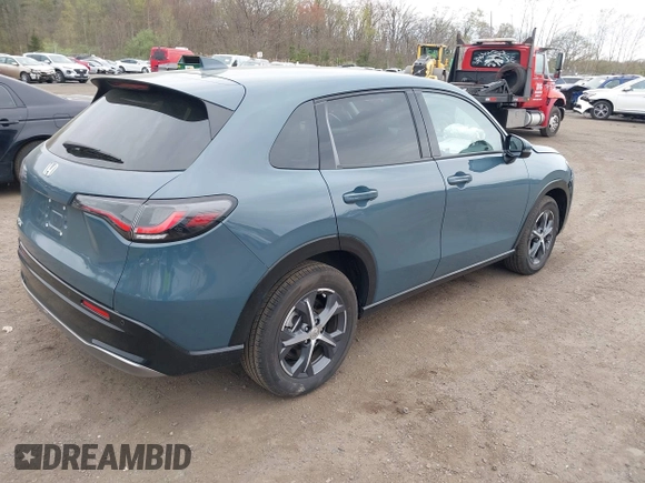 2024 Honda HR-V EX-L with VIN 3CZRZ2H72RM754452, listed as a IAAI auction lot 42082347 with 4,866 mi miles and . Bid and sale history available at DreamBid. Image 4.