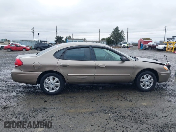 2006 Ford Taurus SE z VIN 1FAFP53U26A197294, wystawiony jako IAAI lot #41506334 z przebiegiem 180 411 mil mil oraz . Historia ofert i sprzedaży dostępna na DreamBid. Obrazek 13.