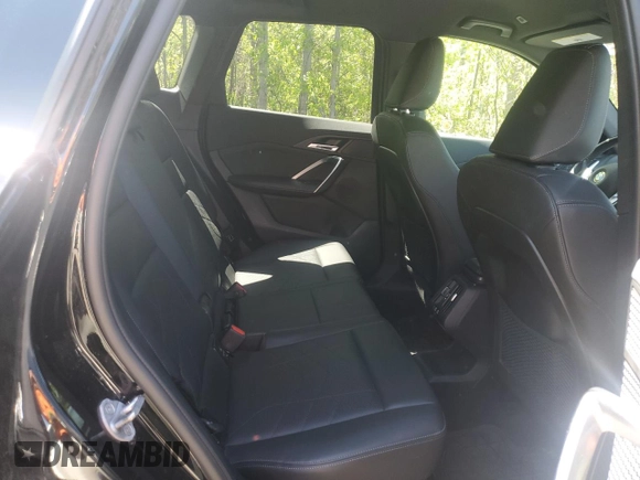 2023 BMW X1 xDrive28i with VIN WBX73EF04P5X86962, listed as a Copart auction lot 57575815 with 95,965 mi miles and Salvage title. Bid and sale history available at DreamBid. Image 11.