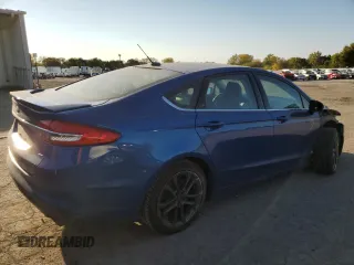 2018 Ford Fusion SE z VIN 3FA6P0H71JR107704, wystawiony jako Copart lot #75017244 z przebiegiem 202 999 mil mil oraz Nie do naprawy • Non repairable. Historia ofert i sprzedaży dostępna na DreamBid. Obrazek 3.