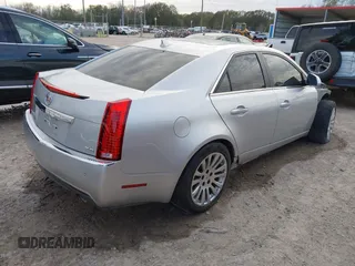 2012 Cadillac CTS Premium with VIN 1G6DP5E34C0124972, listed as a IAAI auction lot 41245338 with 111,140 mi miles and . Bid and sale history available at DreamBid. Image 4.