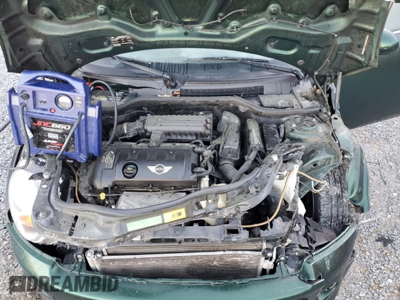 2011 MINI Hardtop with VIN WMWSU3C57BTX97173, listed as a Copart auction lot 50369155 with 122,713 mi miles and Salvage Title. Bid and sale history available at DreamBid. Image 11.