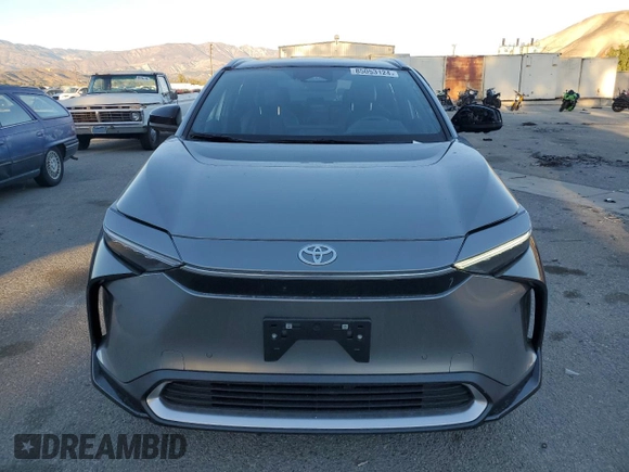 2023 Toyota bZ4X XLE with VIN JTMAAAAAXPA019772, listed as a Copart auction lot 85053124 with 9,591 mi miles and Salvage Title. Bid and sale history available at DreamBid. Image 5.