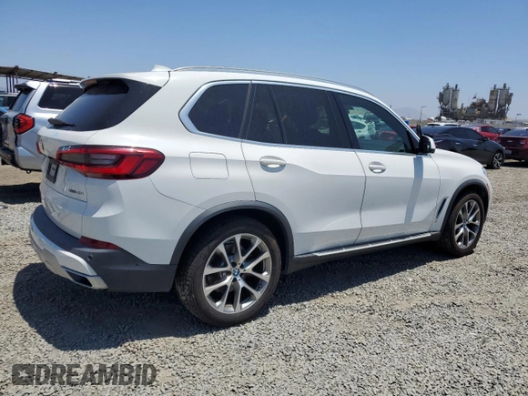 2019 BMW X5 xDrive40i with VIN 5UXCR6C54KLK88490, listed as a Copart auction lot 57917005 with 50,948 mi miles and Salvage title. Bid and sale history available at DreamBid. Image 3.