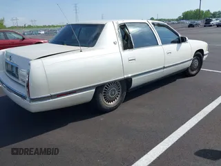 1995 Cadillac DeVille z VIN 1G6KD52BXSU278072, wystawiony jako IAAI lot #42036812 z przebiegiem 149 180 mil mil oraz . Historia ofert i sprzedaży dostępna na DreamBid. Obrazek 4.