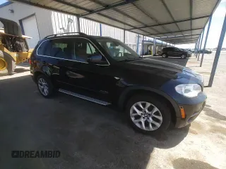 2013 BMW X5 xDrive35i z VIN 5UXZV4C56D0E11871, wystawiony jako Copart lot #58247665 z przebiegiem 136 874 mil mil oraz Szkoda całkowita • Salvage title. Historia ofert i sprzedaży dostępna na DreamBid. Obrazek 13.