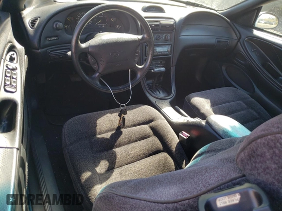 1994 Ford Mustang with VIN 1FALP4442RF186105, listed as a Copart auction lot 74677924 with 185,072 mi miles and Clean title. Bid and sale history available at DreamBid. Image 8.