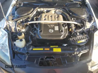 2004 Nissan 350Z Enthusiast z VIN JN1AZ36A74T015422, wystawiony jako Copart lot #77537194 z przebiegiem 147 466 mil mil oraz Nie do naprawy • Non repairable. Historia ofert i sprzedaży dostępna na DreamBid. Obrazek 11.