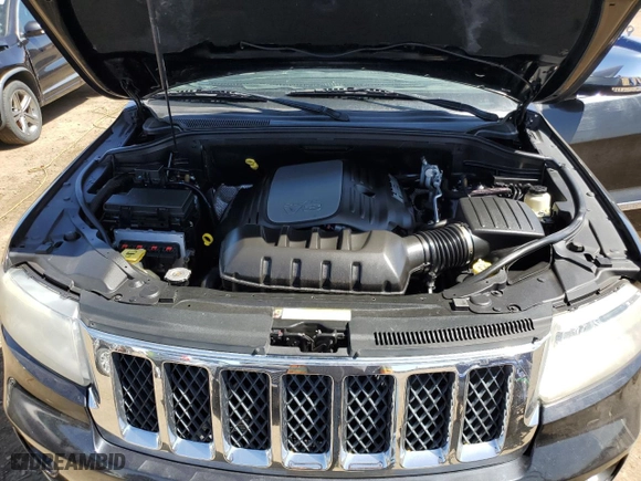 2011 Jeep Grand Cherokee Overland with VIN 1J4RR6GT4BC541497, listed as a Copart auction lot 52121595 with 143,010 mi miles and Clean Title. Bid and sale history available at carsss.com. Image 12.