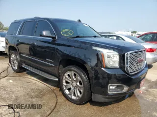 2015 GMC Yukon Denali with VIN 1GKS2CKJXFR547358, listed as a Copart auction lot 63906734 with 163,980 mi miles and Salvage Title. Bid and sale history available at carsss.com. Image 4.