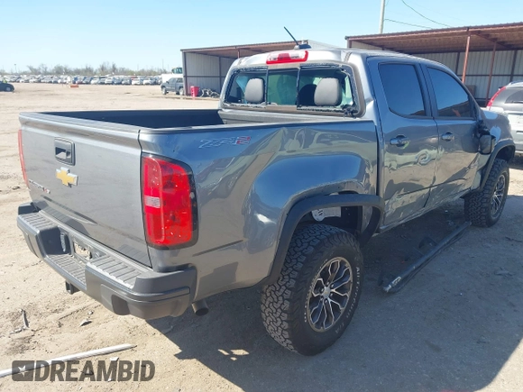 2018 Chevrolet Colorado 4WD ZR2 z VIN 1GCGTEEN0J1115894, wystawiony jako IAAI lot #41774860 z przebiegiem 71 698 mil mil oraz . Historia ofert i sprzedaży dostępna na DreamBid. Obrazek 4.