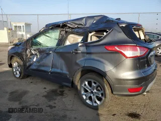 2015 Ford Escape Titanium with VIN 1FMCU0J99FUA26849, listed as a Copart auction lot 50583825 with Not provided miles and Salvage title. Bid and sale history available at DreamBid. Image 2.