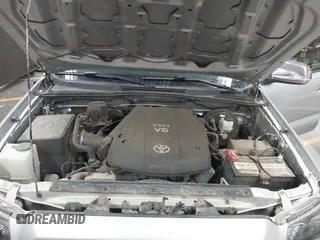 2013 Toyota Tacoma z VIN 3TMLU4EN0DM123507, wystawiony jako IAAI lot #42691592 z przebiegiem 100 894 mil mil oraz . Historia ofert i sprzedaży dostępna na DreamBid. Obrazek 10.