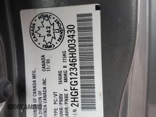 2006 Honda Civic z VIN 2HGFG12346H003430, wystawiony jako Copart lot #85204224 z przebiegiem 338 824 mil mil oraz Czysty tytuł • Clean title. Historia ofert i sprzedaży dostępna na DreamBid. Obrazek 13.