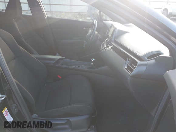 2018 Toyota C-HR XLE with VIN JTNKHMBX6J1007058, listed as a IAAI auction lot 42100587 with 71,725 mi miles and . Bid and sale history available at DreamBid. Image 5.