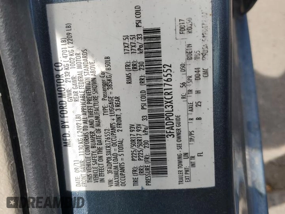 2012 Ford Fusion Hybrid z VIN 3FADP0L3XCR176552, wystawiony jako Copart lot #55787415 z przebiegiem 156 806 mil mil oraz Szkoda całkowita • Salvage title. Historia ofert i sprzedaży dostępna na DreamBid. Obrazek 12.