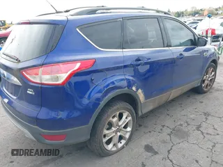 2013 Ford Escape SEL with VIN 1FMCU9HX0DUD89188, listed as a IAAI auction lot 42025465 with 161,590 mi miles. Bid and sale history available at carsss.com. Image 6.