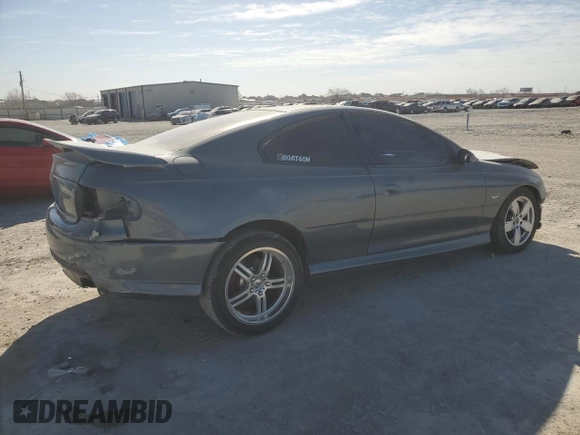 2005 Pontiac GTO z VIN 6G2VX12U45L456331, wystawiony jako Copart lot #45998595 z przebiegiem 86 291 mil mil oraz Szkoda całkowita • Salvage title. Historia ofert i sprzedaży dostępna na DreamBid. Obrazek 3.