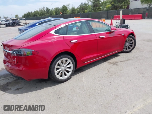 2018 Tesla Model S 75D with VIN 5YJSA1E29JF273494, listed as a IAAI auction lot 42246104 with 93,870 mi miles and . Bid and sale history available at DreamBid. Image 4.