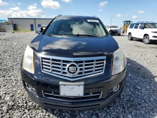 2013 Cadillac SRX Performance Collection with VIN 3GYFNHE37DS649235, listed as a Copart auction lot 56939285 with 104,692 mi miles and Salvage title. Bid and sale history available at DreamBid. Image 5.