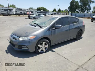 2012 Honda Insight z VIN JHMZE2H30CS003488, wystawiony jako Copart lot #59016385 z przebiegiem Nie podano mil oraz Szkoda całkowita • Salvage title. Historia ofert i sprzedaży dostępna na DreamBid. Obrazek 1.