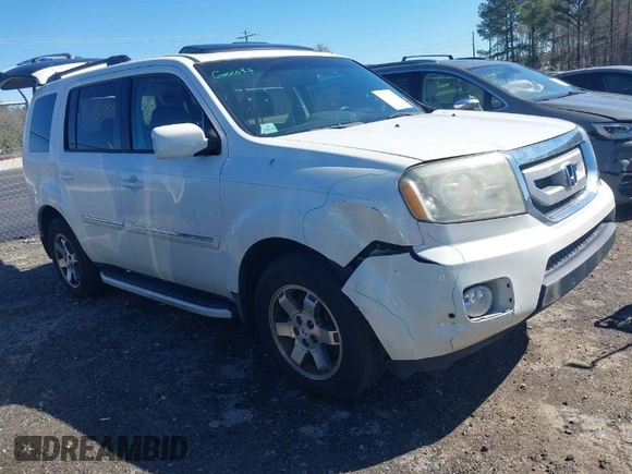 2011 Honda Pilot Touring with VIN 5FNYF4H97BB067954, listed as a IAAI auction lot 41832617 with 141,141 mi miles. Bid and sale history available at carsss.com. Image 1.