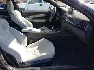 2015 BMW M4 with VIN WBS3R9C58FK334247, listed as a IAAI auction lot 41940211 with 125,881 mi miles. Bid and sale history available at carsss.com. Image 5.