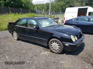 2002 Mercedes-Benz E-Class with VIN WDBJF82J62X067198, listed as a Copart auction lot 66073494 with 0 mi miles and Salvage Title. Bid and sale history available at carsss.com. Image 4.