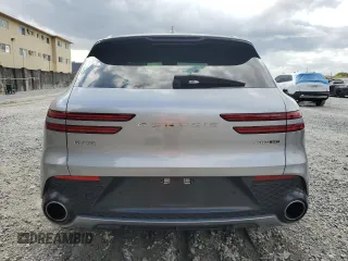 2023 Genesis GV70 Sport with VIN KMUMCDTC3PU098818, listed as a Copart auction lot 52884225 with 25,748 mi miles and Non Repairable. Bid and sale history available at DreamBid. Image 6.