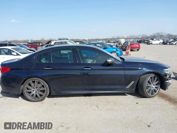 2018 BMW 5 Series M550i xDrive with VIN WBAJB9C55JB286036, listed as a IAAI auction lot 41738640 with 79,049 mi miles and . Bid and sale history available at DreamBid. Image 13.