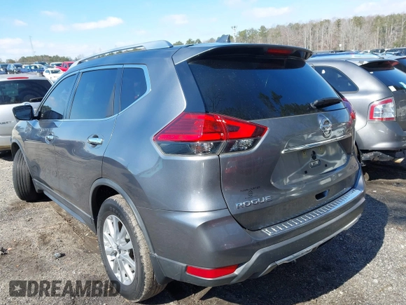 2017 Nissan Rogue S with VIN KNMAT2MT1HP611184, listed as a IAAI auction lot 41632876 with 142,488 mi miles. Bid and sale history available at carsss.com. Image 3.