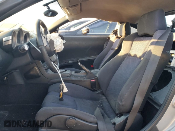2004 Nissan 350Z Enthusiast with VIN JN1AZ34E74T063248, listed as a Copart auction lot 81887054 with 124,548 mi miles and Salvage Title. Bid and sale history available at DreamBid. Image 7.