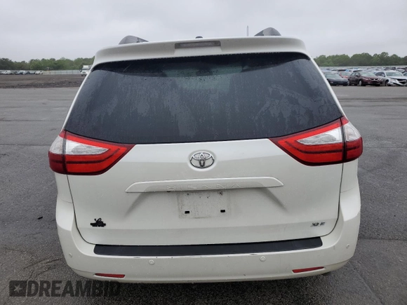 2016 Toyota Sienna XLE with VIN 5TDYK3DC8GS748036, listed as a Copart auction lot 60047235 with 147,203 mi miles and Salvage title. Bid and sale history available at DreamBid. Image 6.