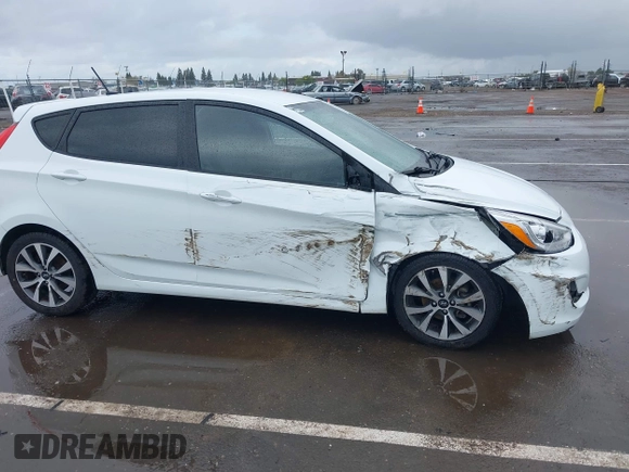 2016 Hyundai Accent Sport with VIN KMHCU5AE4GU249974, listed as a IAAI auction lot 41916351 with 127,692 mi miles. Bid and sale history available at carsss.com. Image 6.