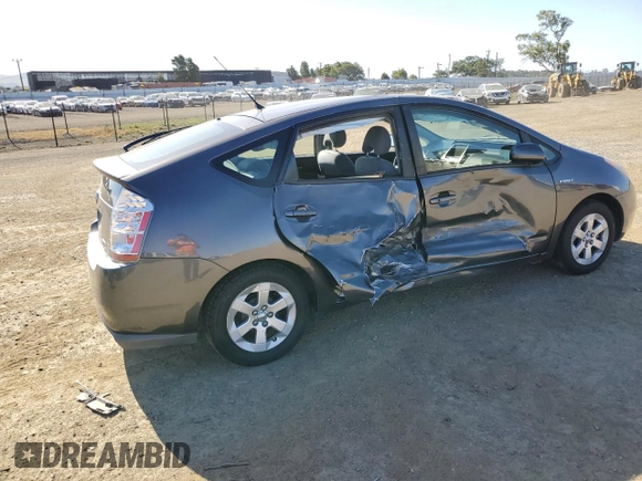 2007 Toyota Prius z VIN JTDKB20U573288978, wystawiony jako Copart lot #57469155 z przebiegiem 170 422 mil mil oraz Szkoda całkowita • Salvage title. Historia ofert i sprzedaży dostępna na DreamBid. Obrazek 3.