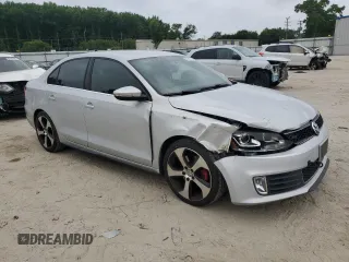 2013 Volkswagen Jetta with VIN 3VW5S7AJ5DM307972, listed as a Copart auction lot 62768225 with 164,118 mi miles and Salvage title. Bid and sale history available at DreamBid. Image 4.