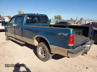 2000 Ford Super Duty F-250 XL with VIN 1FTNW21S9YED38978, listed as a Copart auction lot 81680254 with 197,016 mi miles and Salvage Title. Bid and sale history available at carsss.com. Image 2.