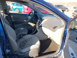 2015 Hyundai Accent GLS with VIN KMHCT4AE6FU916149, listed as a IAAI auction lot 41082268 with 153,219 mi miles. Bid and sale history available at carsss.com. Image 5.