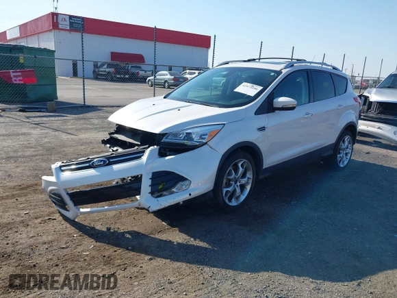 2013 Ford Escape Titanium with VIN 1FMCU0J97DUA70393, listed as a IAAI auction lot 41974106 with 73,548 mi miles and . Bid and sale history available at carsss.com. Image 18.