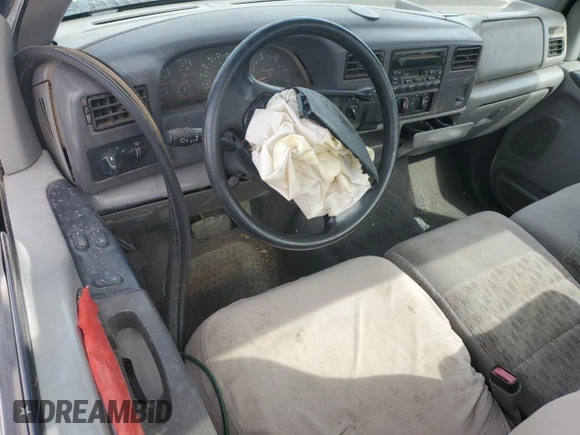 1999 Ford Super Duty F-250 XL with VIN 1FTNF21F7XEA07513, listed as a Copart auction lot 49390225 with 173,726 mi miles and Salvage Title. Bid and sale history available at carsss.com. Image 8.