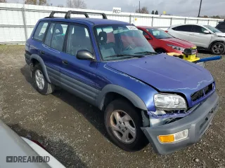 1998 Toyota RAV4 with VIN JT3HP10V5W0172067, listed as a Copart auction lot 84850544 with 316,659 mi miles and Salvage Title. Bid and sale history available at carsss.com. Image 4.