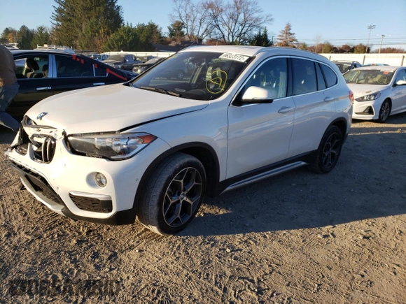 2018 BMW X1 xDrive28i with VIN WBXHT3C38J5L31384, listed as a Copart auction lot 66323172 with 74,272 mi miles. Bid and sale history available at carsss.com. Image 2.