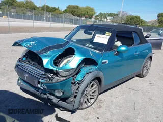 2016 MINI Convertible z VIN WMWWG5C5XG3A83276, wystawiony jako IAAI lot #41864830 z przebiegiem 103 721 mil mil oraz . Historia ofert i sprzedaży dostępna na DreamBid. Obrazek 2.