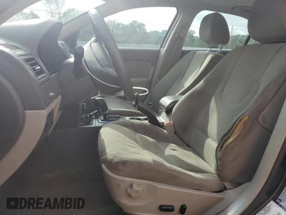 2010 Ford Fusion Hybrid with VIN 3FADP0L35AR138806, listed as a Copart auction lot 63656235 with 172,449 mi miles and Salvage title. Bid and sale history available at DreamBid. Image 7.