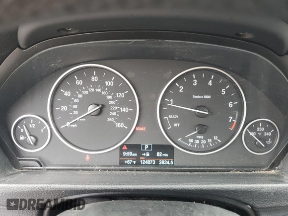 2013 BMW 3 Series 328i xDrive with VIN WBA3B5C53DF595177, listed as a Copart auction lot 57024375 with 124,873 mi miles and Salvage title. Bid and sale history available at DreamBid. Image 9.