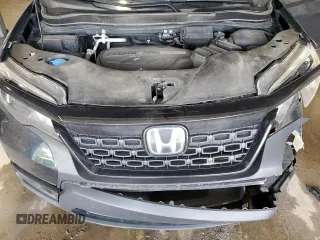 2020 Honda Passport EX-L with VIN 5FNYF8H57LB011549, listed as a Copart auction lot 59123735 with 127,797 mi miles and Salvage title. Bid and sale history available at DreamBid. Image 12.