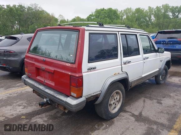 1991 Jeep Cherokee with VIN 1J4FJ58S3ML563620, listed as a IAAI auction lot 42131093 with 198,942 mi miles and . Bid and sale history available at DreamBid. Image 4.