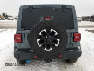 2024 Jeep Wrangler Rubicon with VIN 1C4RJXR66RW237347, listed as a Copart auction lot 88774995 with 18,018 mi miles and Salvage Title. Bid and sale history available at DreamBid. Image 6.