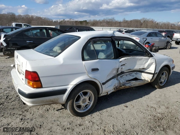 1997 Toyota Tercel DX with VIN JT2BC52L5V0215622, listed as a Copart auction lot 87475544 with 382,242 mi miles and Salvage Title. Bid and sale history available at carsss.com. Image 3.